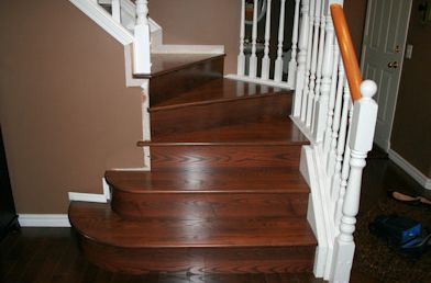 Rich dark walnut stain on ash hardwood