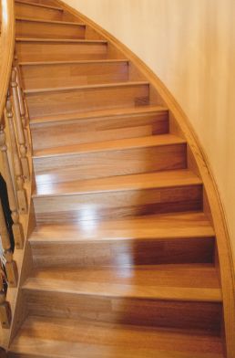 At level – hardwood makes the most of a graceful curved staircase