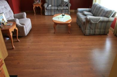 This is one example of how laminate flooring can provide the beautiful appearance of hardwood with a far more durable finish