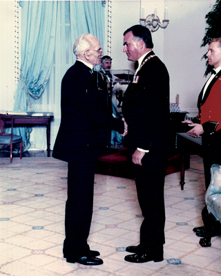 Allen Knight receives the Order of Canada from Gov. General Hnatyshyn.