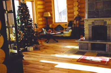This cabin's exquisite hickory main floor covers roughly 1500 square feet.